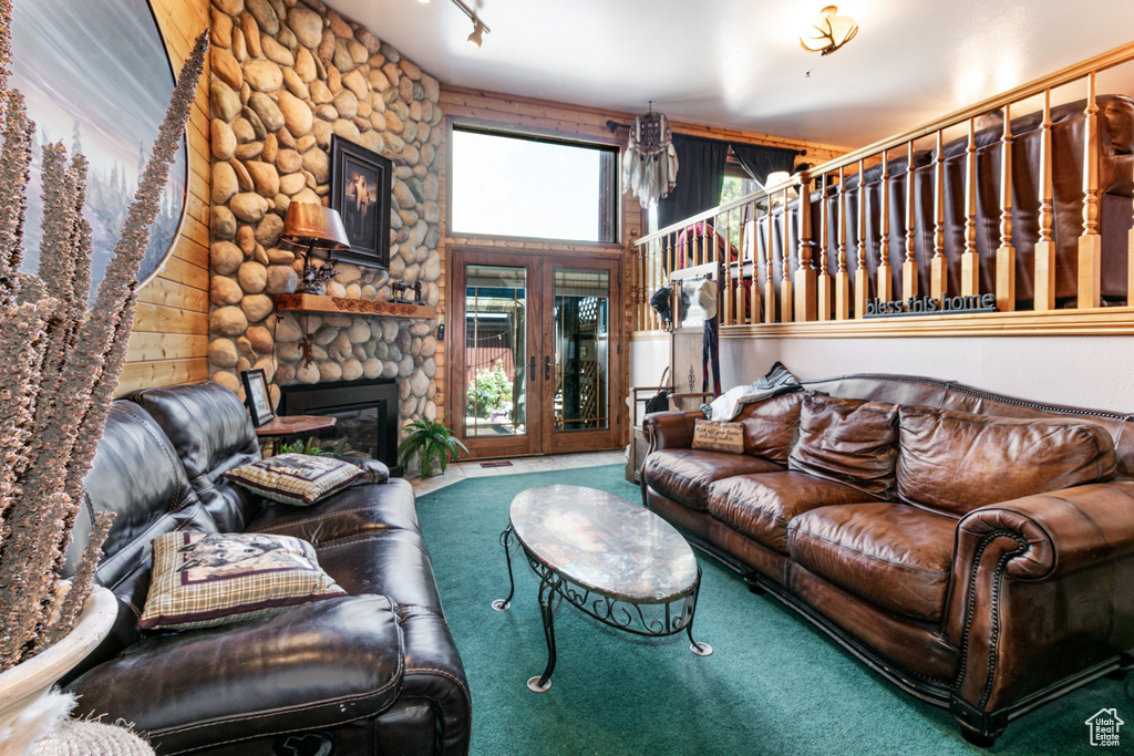 Carpeted living room featuring a fireplace