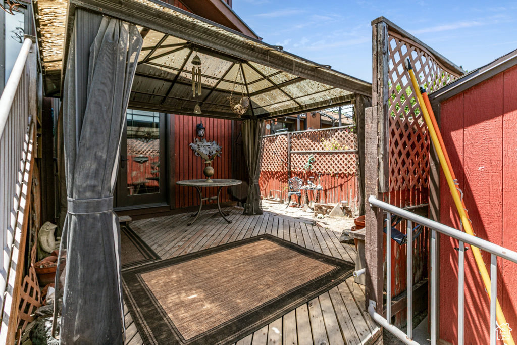 Wooden terrace with a gazebo