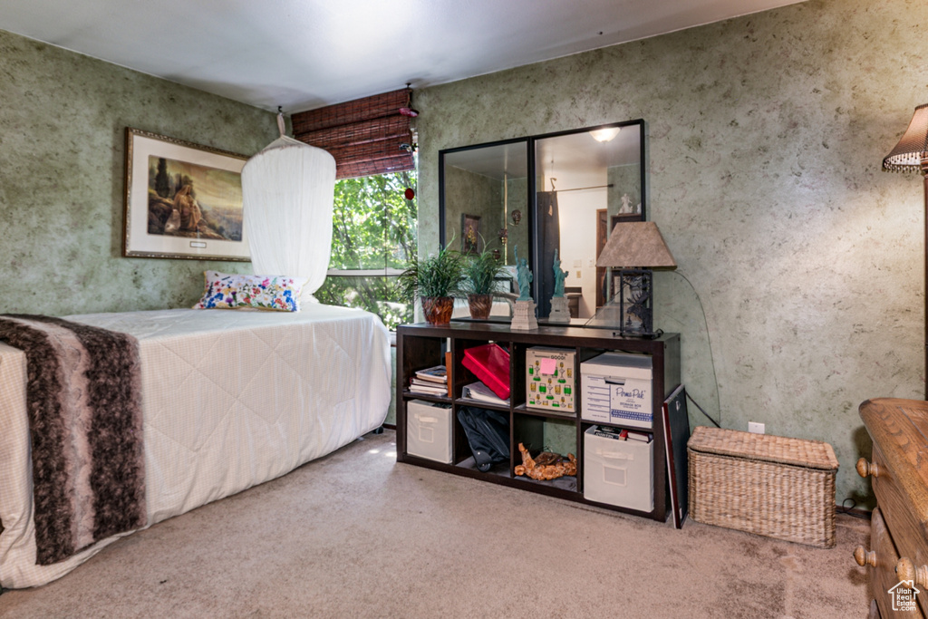 View of carpeted bedroom
