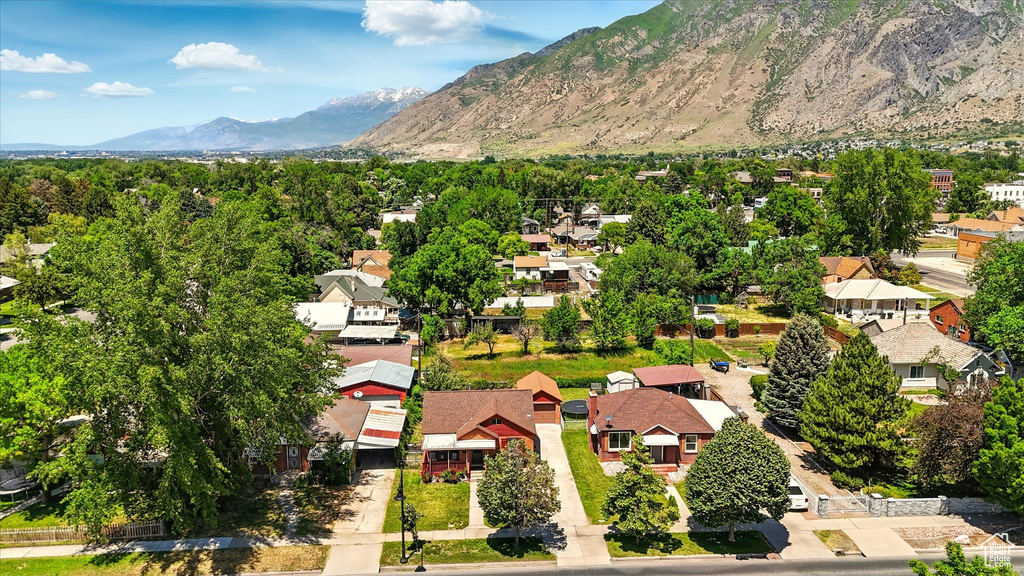 Aerial view of residential area with a mountainous background