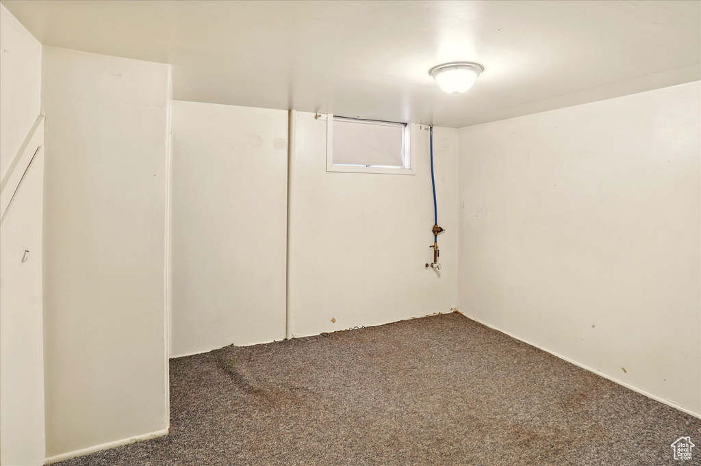 Basement featuring carpet flooring