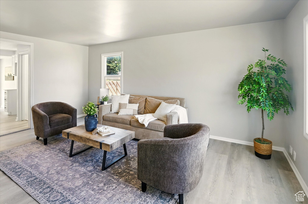 Living area featuring wood finished floors