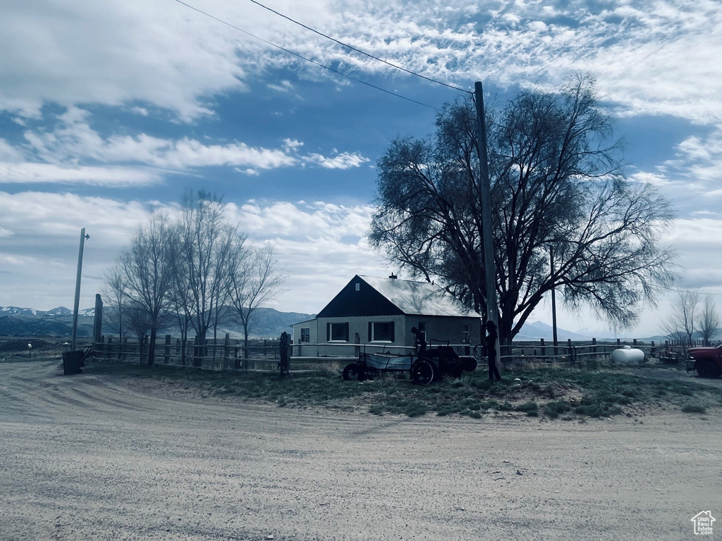 View of front of home featuring a mountain view