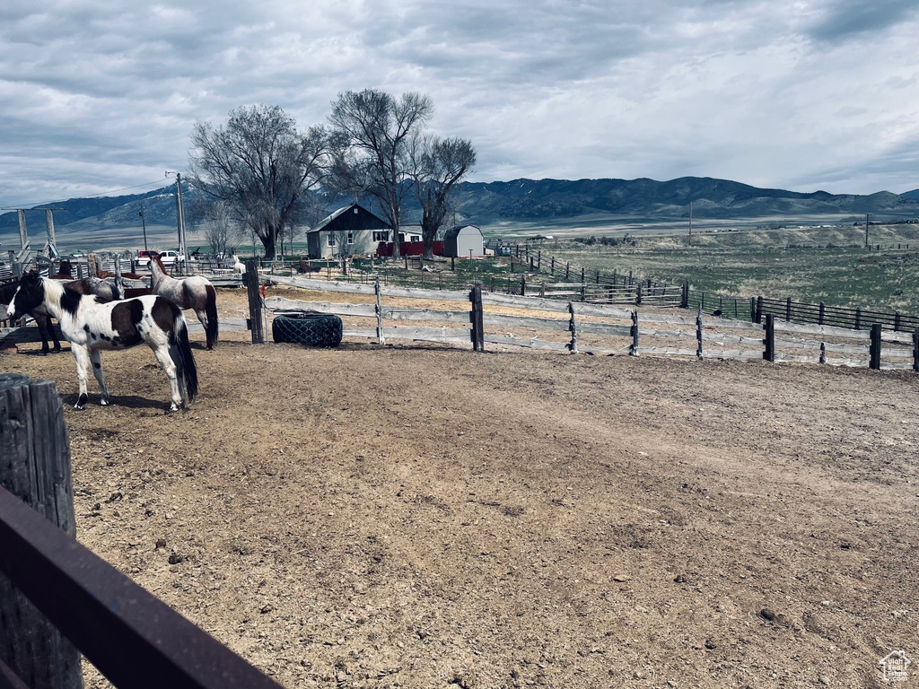 View of yard with a view of countryside and a mountain view