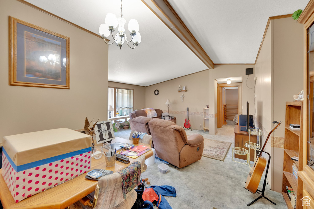 Living room with a chandelier and carpet floors