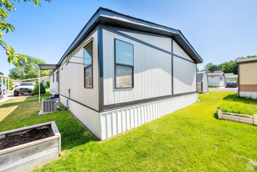 View of home\'s exterior featuring a lawn