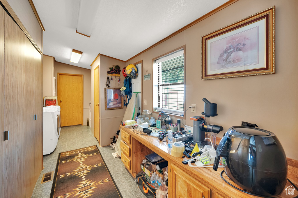 Office space with washer / clothes dryer and baseboards