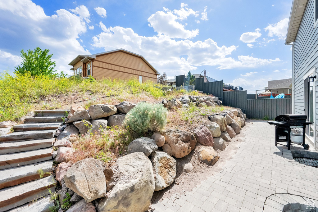 View of yard featuring a patio
