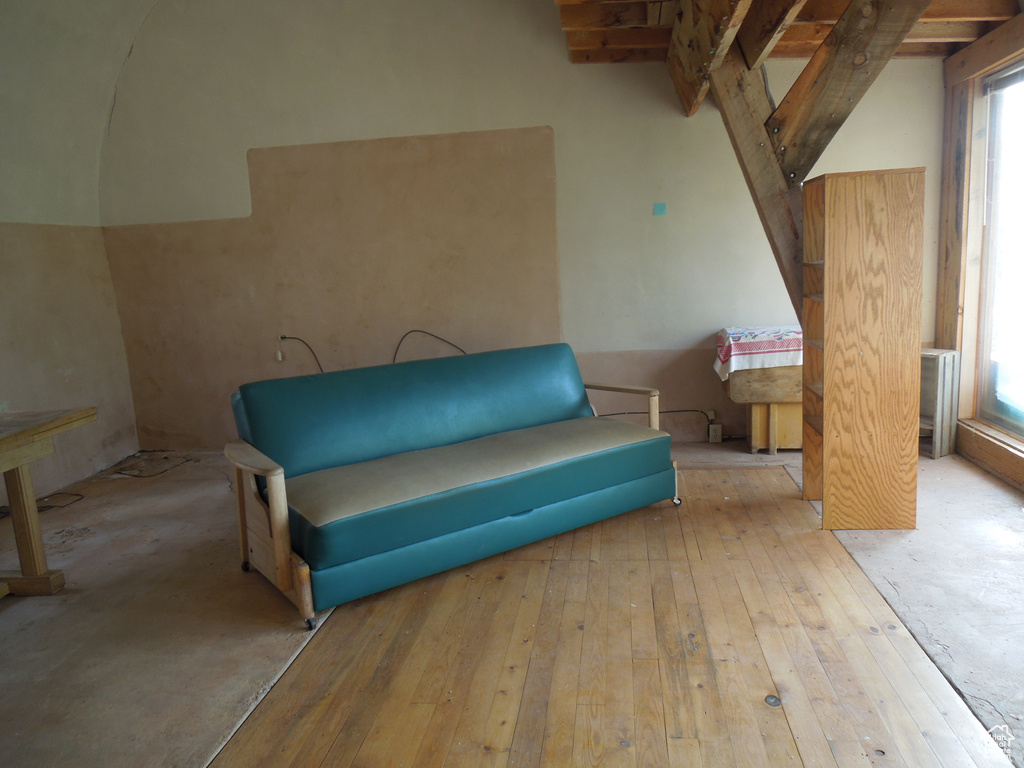 Sitting room with hardwood / wood-style floors