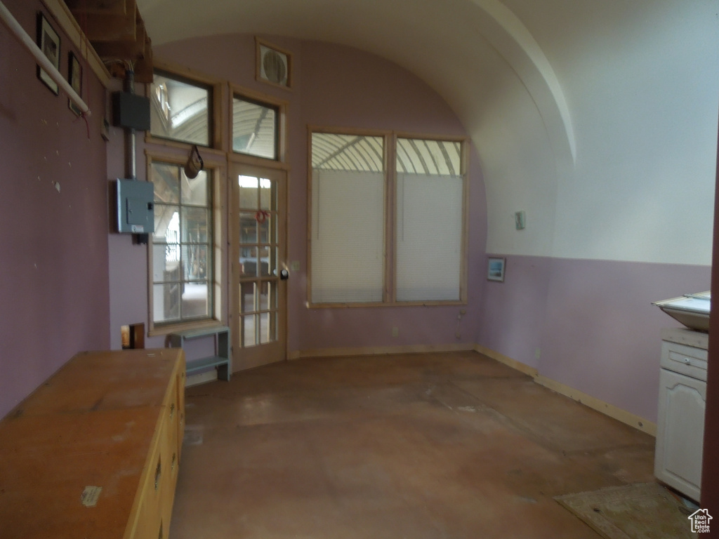 Unfurnished dining area featuring baseboards