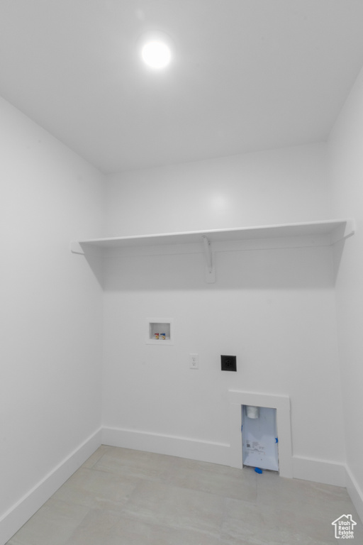 Laundry area with washer hookup and hookup for an electric dryer