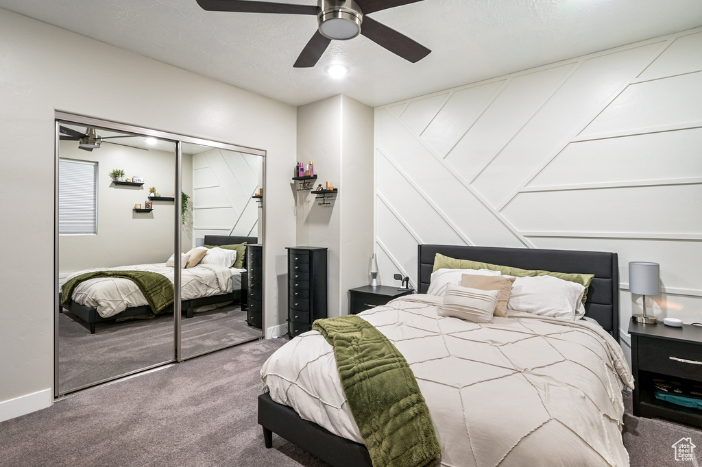 Bedroom featuring carpet, a closet, and ceiling fan