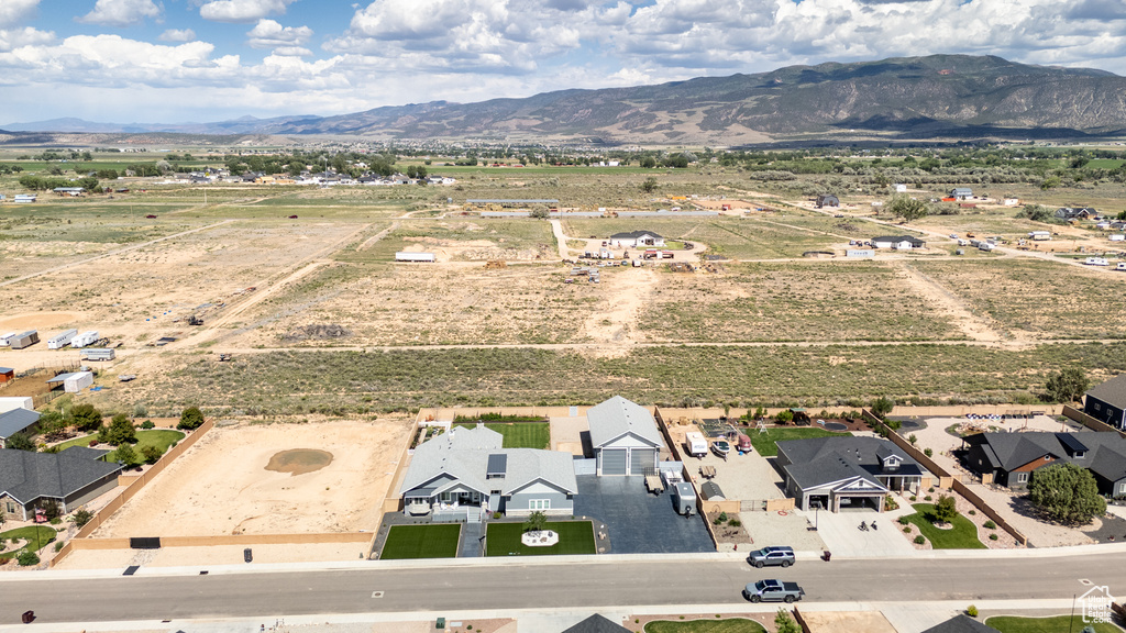 Aerial view of sparsely populated area with mountains