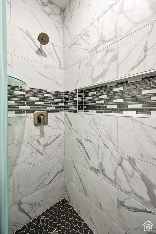 Bathroom with a tile shower