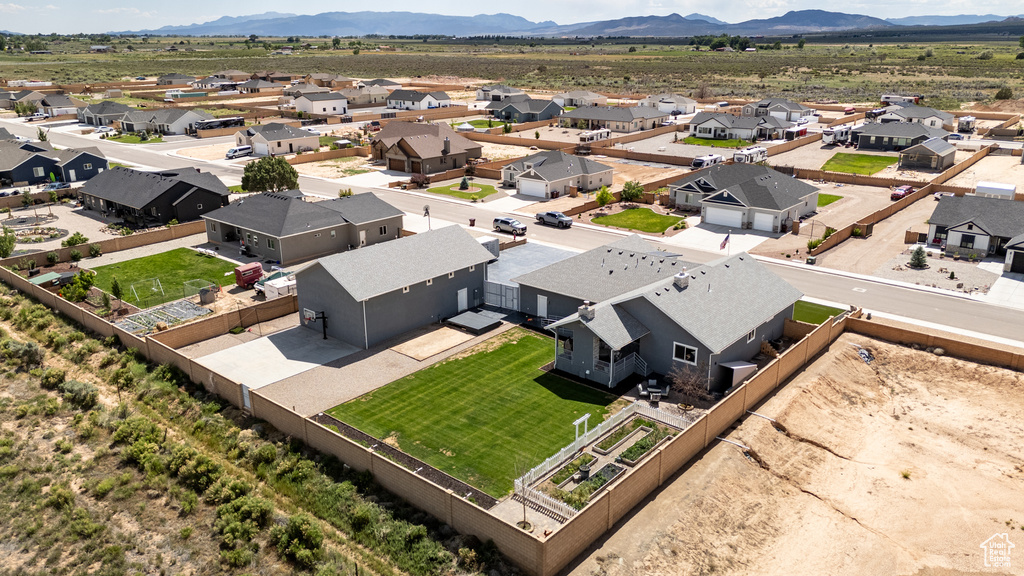 Aerial view of residential area with a mountain backdrop