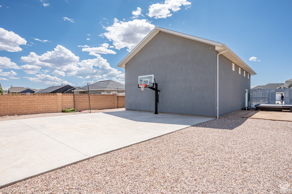 Back of house featuring a fenced backyard