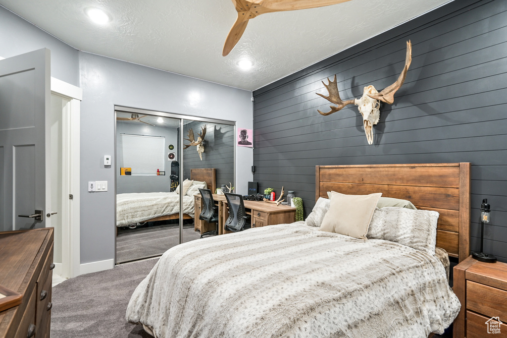 Bedroom featuring carpet floors, a closet, a ceiling fan, and recessed lighting