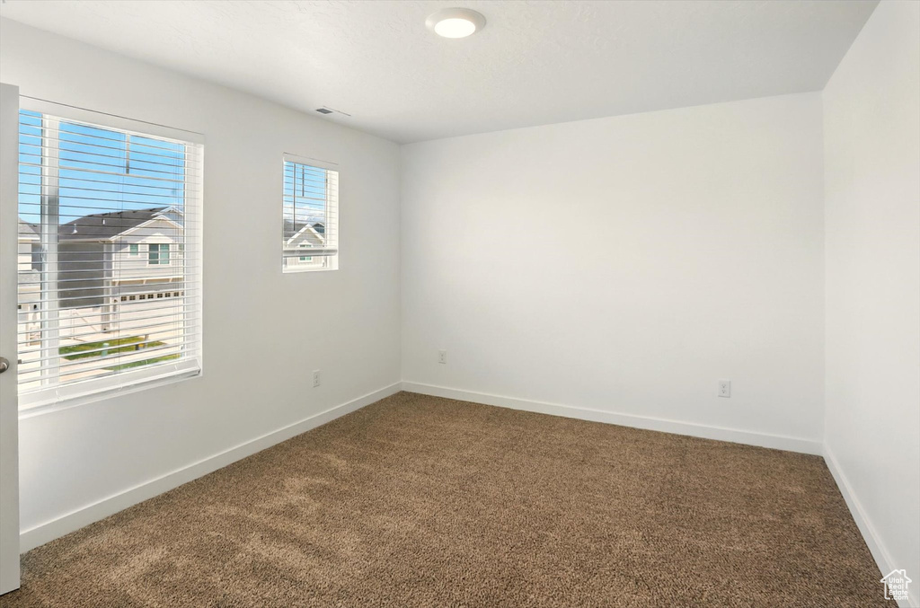 Unfurnished room featuring carpet floors