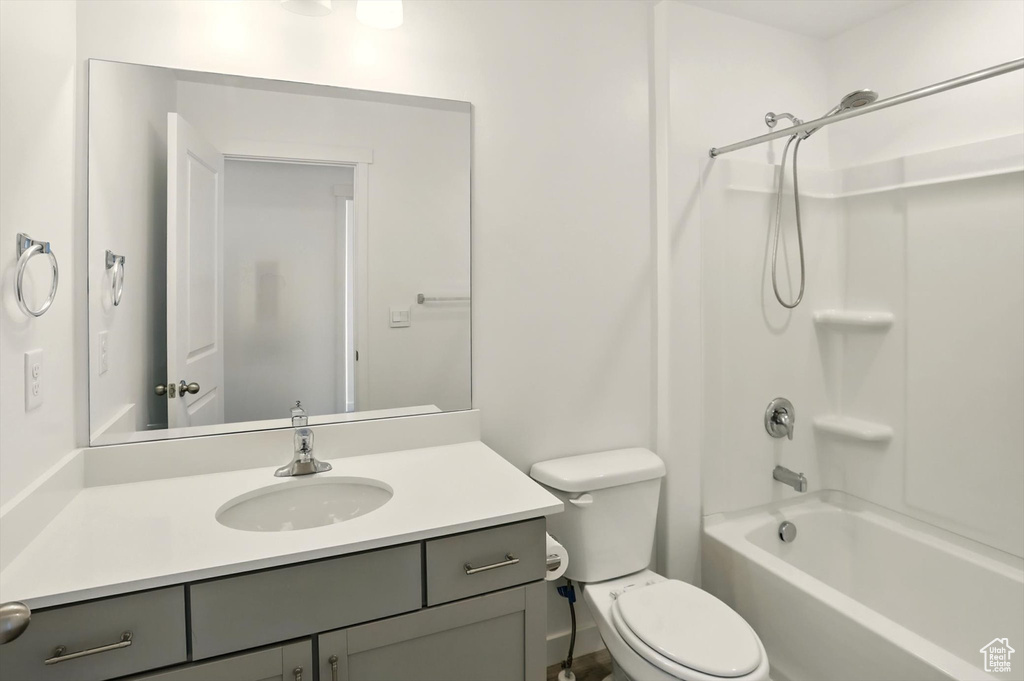 Bathroom featuring vanity and bathing tub / shower combination