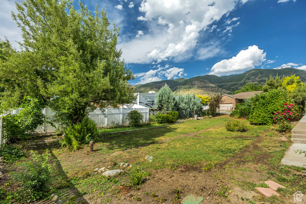 View of yard with a mountain view