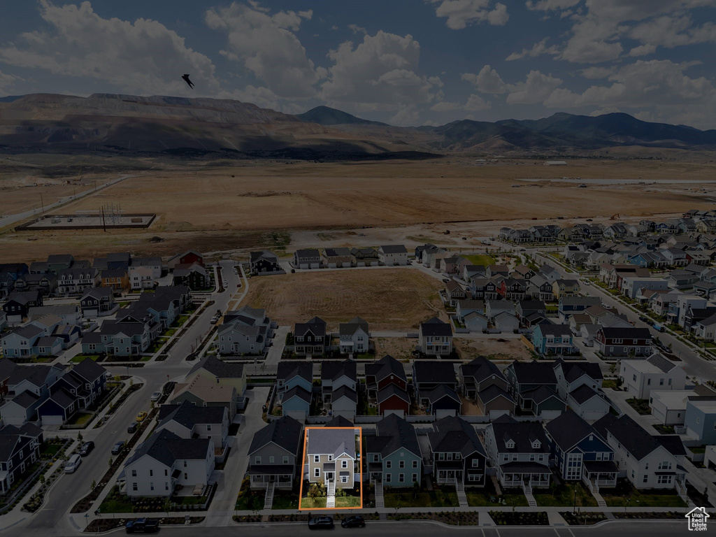 Aerial view of residential area with mountains