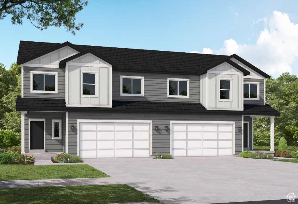 Modern inspired farmhouse with a garage, board and batten siding, a shingled roof, and driveway