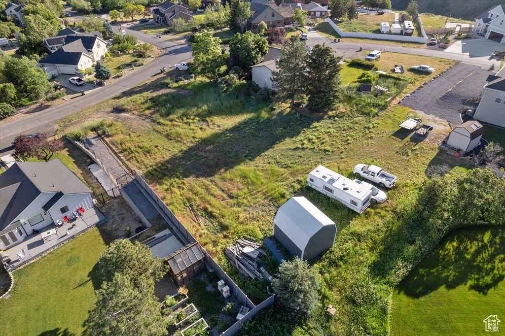 View of property location with nearby suburban area