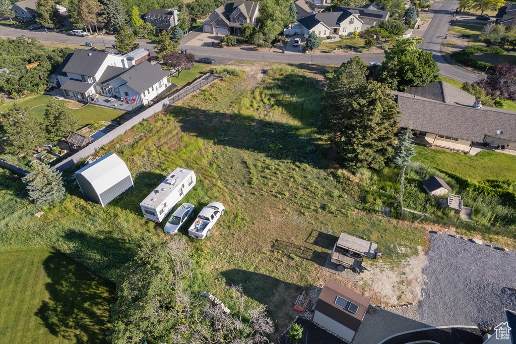 Aerial view of property's location featuring nearby suburban area