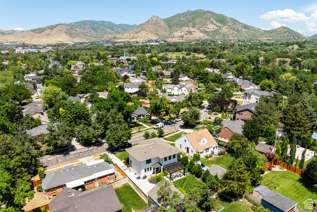 Aerial view of residential area with a mountainous background