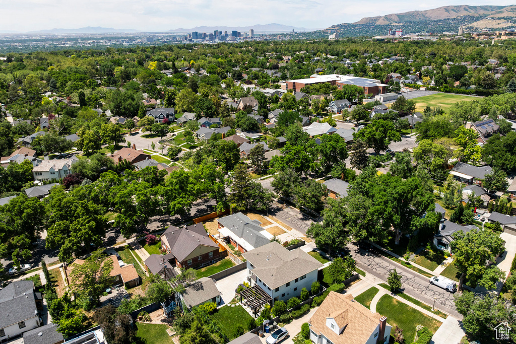 Aerial view of residential area with a mountainous background