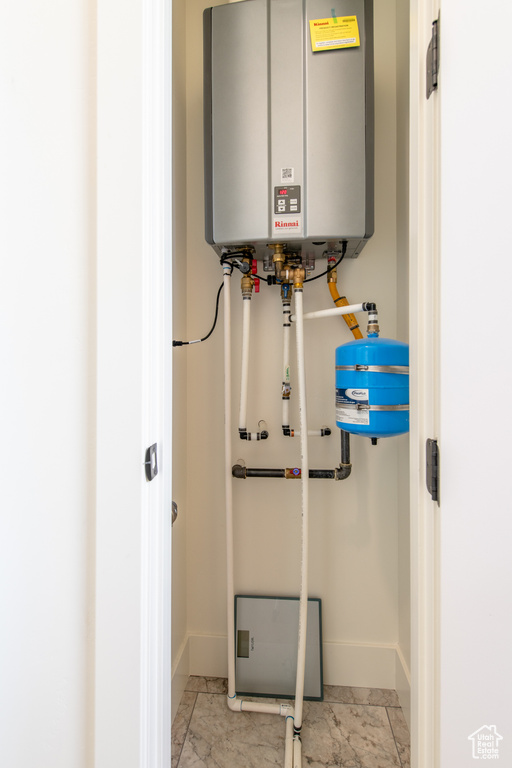 Utility room with tankless water heater