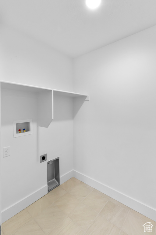 Washroom featuring washer hookup and electric dryer hookup