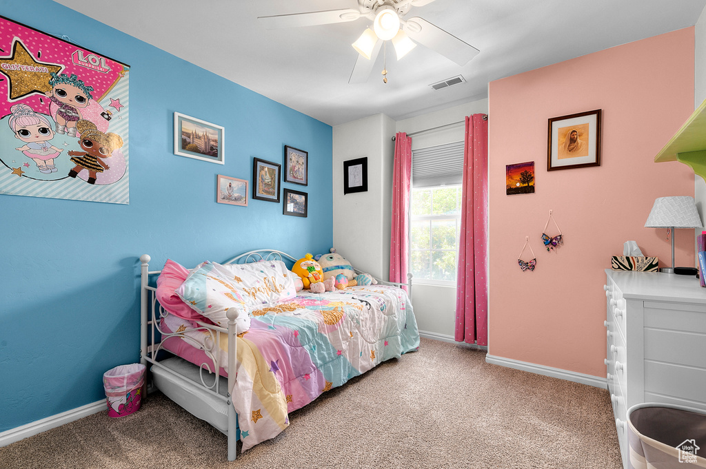 Bedroom featuring carpet floors and a ceiling fan