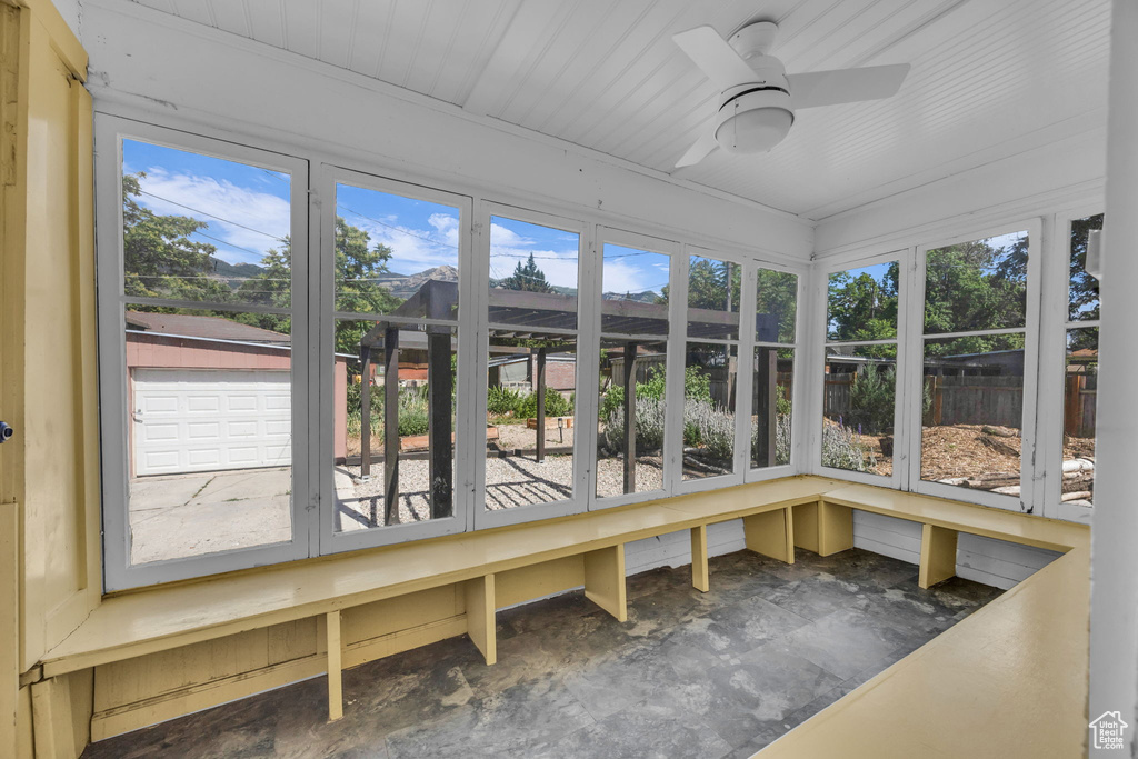 Unfurnished sunroom with plenty of natural light