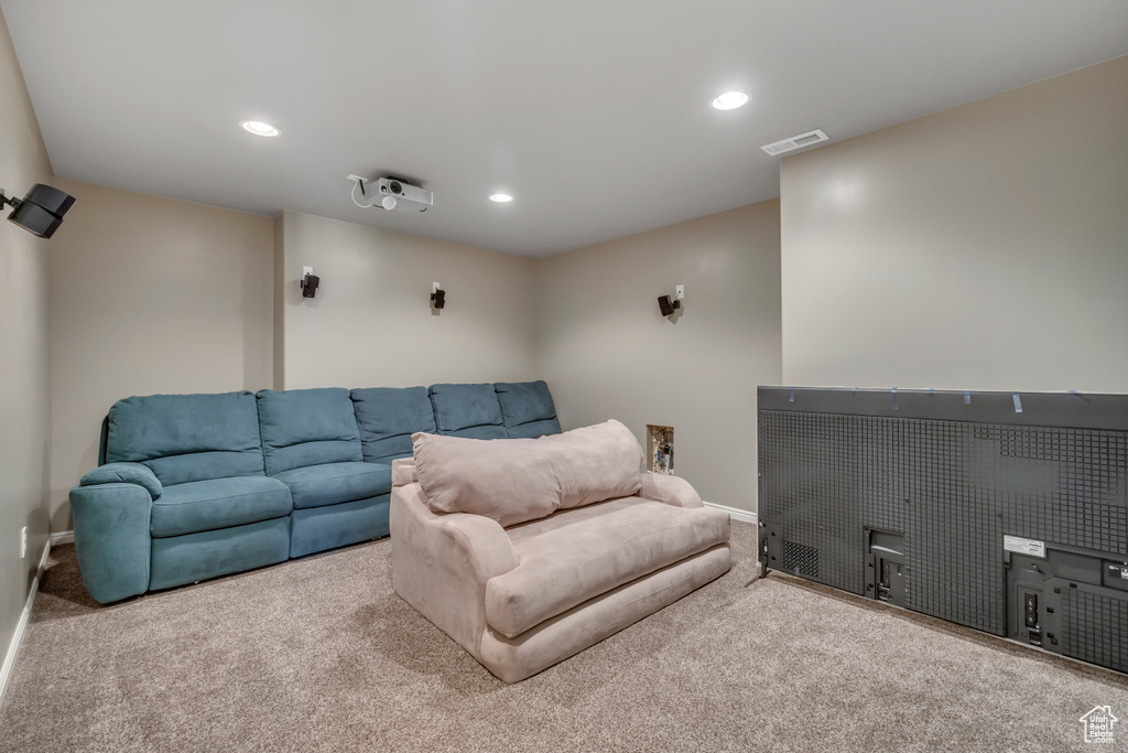 Home theater featuring carpet and recessed lighting