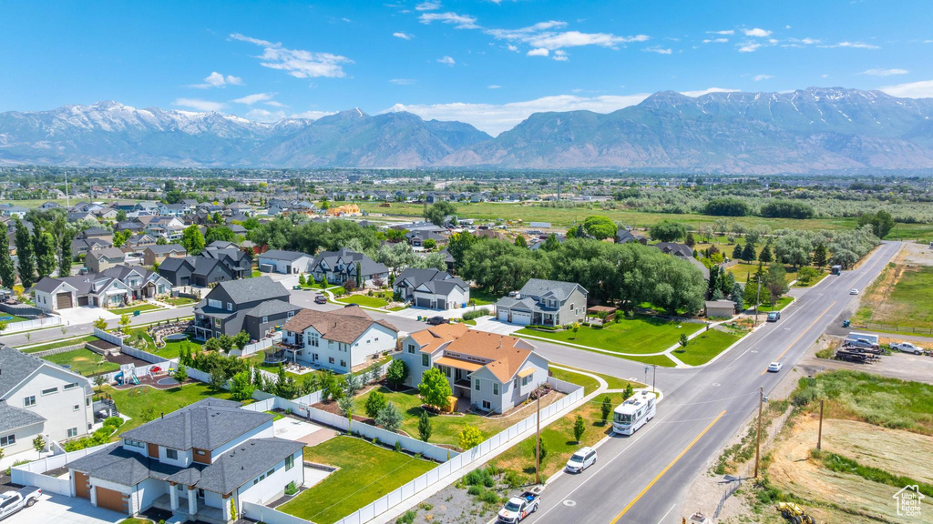 Aerial view of residential area featuring mountains