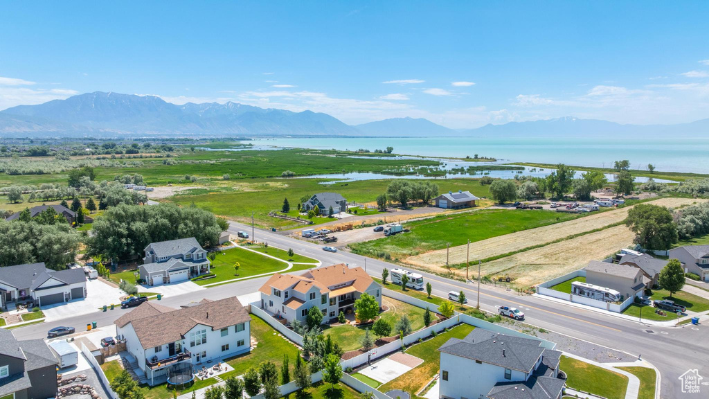Aerial view of residential area with a water and mountain view