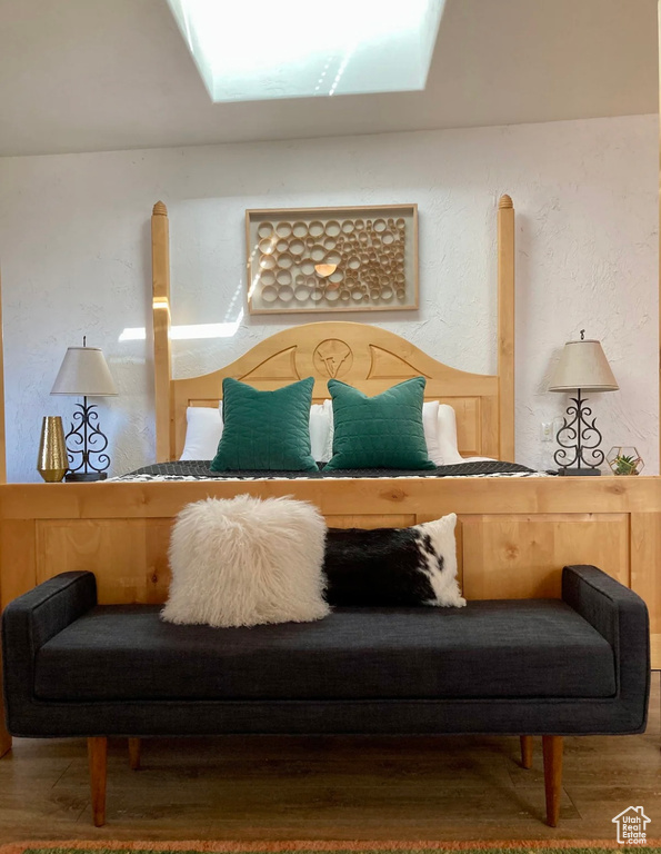 Bedroom featuring wood finished floors