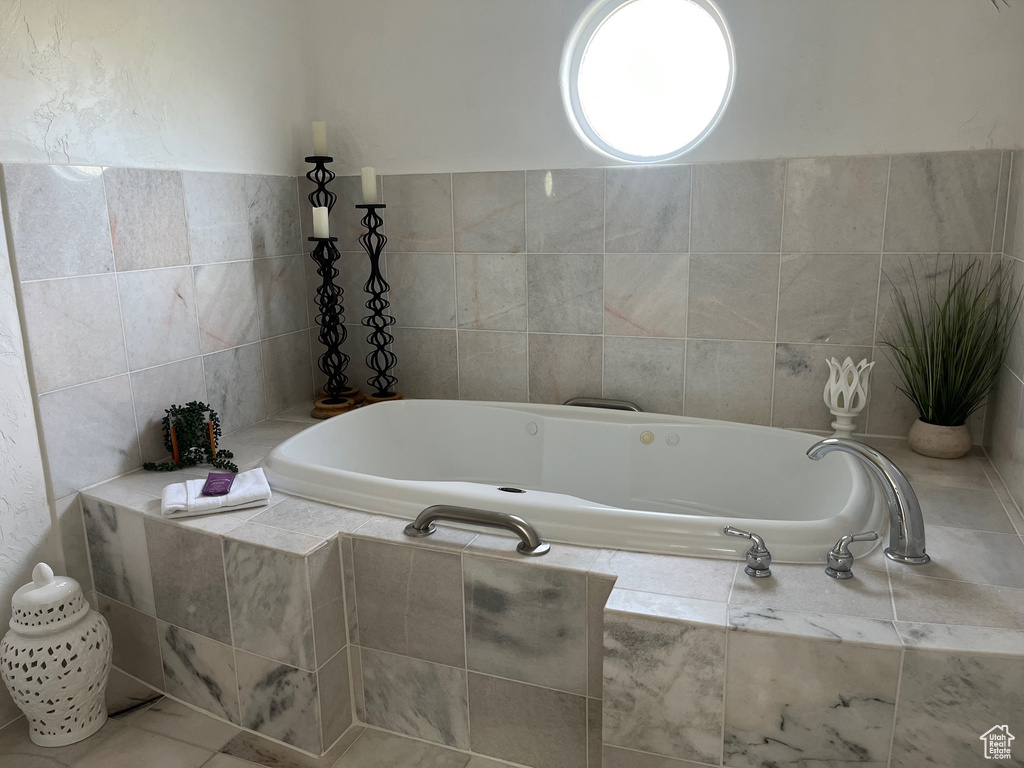 Full bathroom with a garden tub