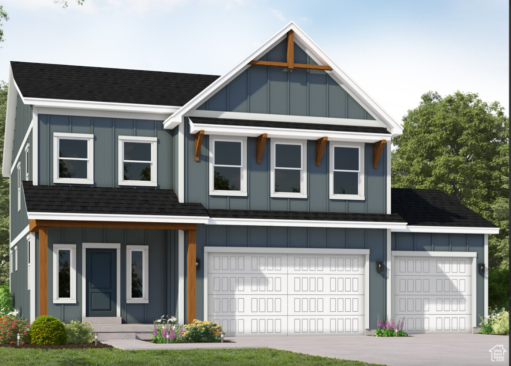 View of front of property with board and batten siding, a shingled roof, driveway, and an attached garage