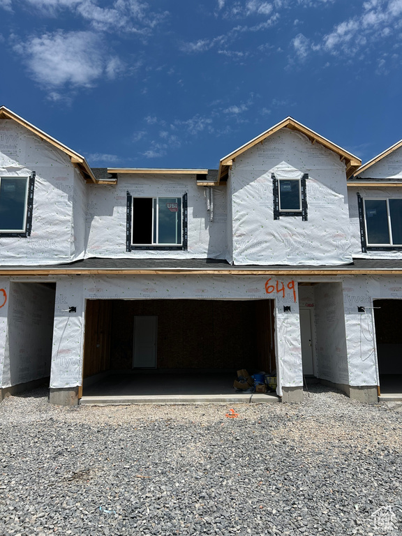 Property in mid-construction with driveway