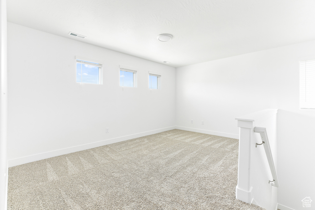 Spare room with carpet flooring and baseboards