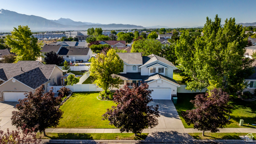 Aerial perspective of suburban area with mountains