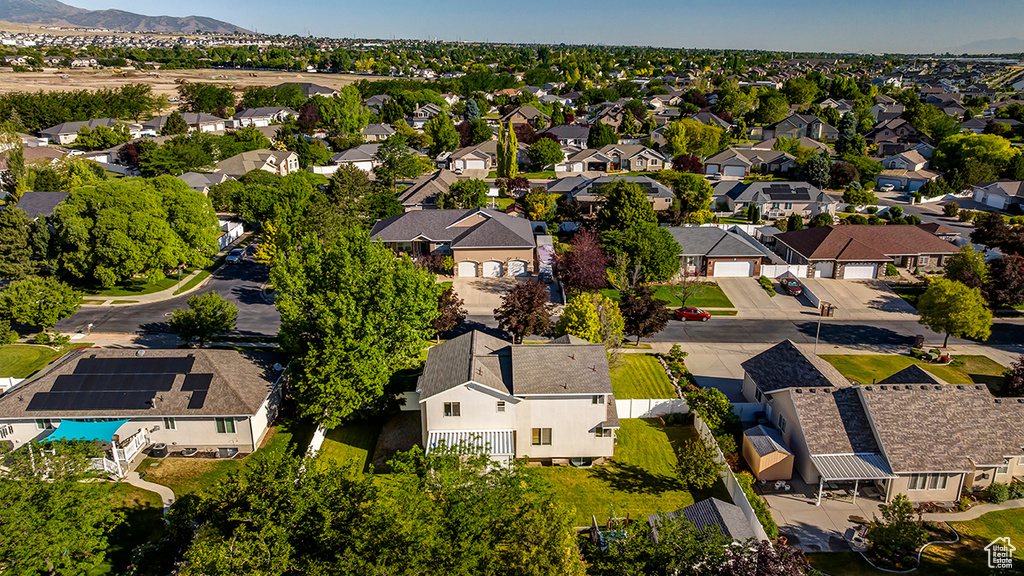Aerial perspective of suburban area featuring mountains