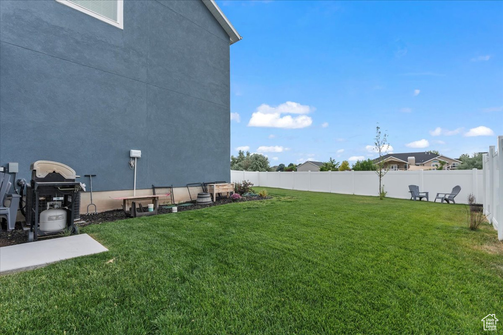 View of fenced backyard