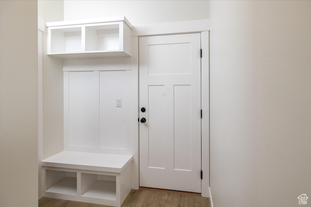 Mudroom featuring light wood-style flooring