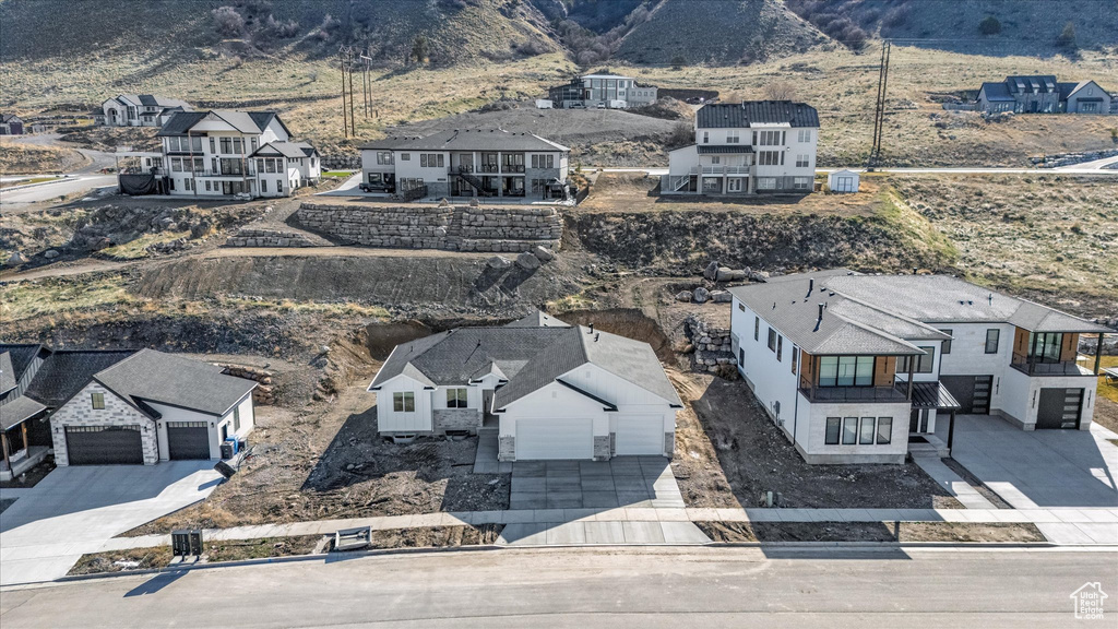 Aerial view of residential area with a mountainous background