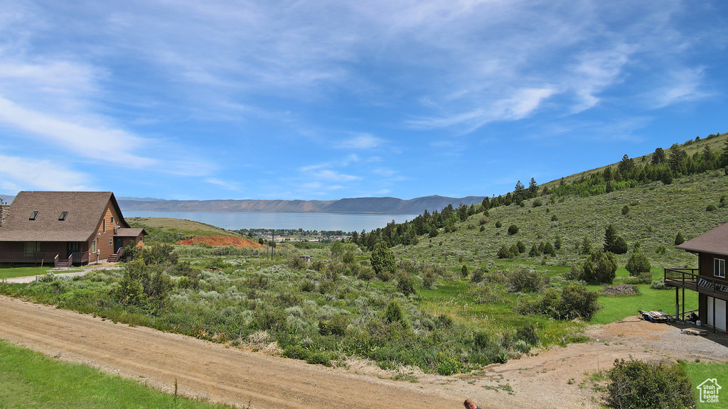 View of mountain backdrop with a large body of water