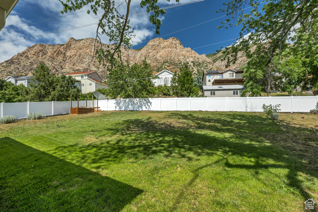 View of yard with a mountain view