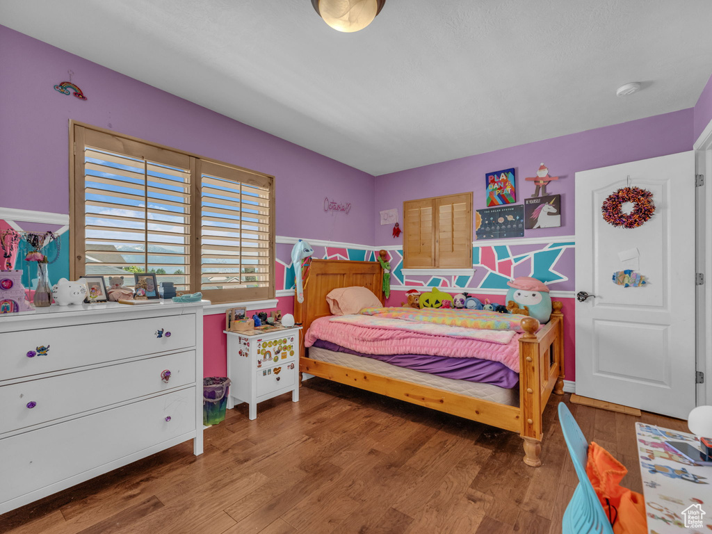 Bedroom with light wood-style flooring